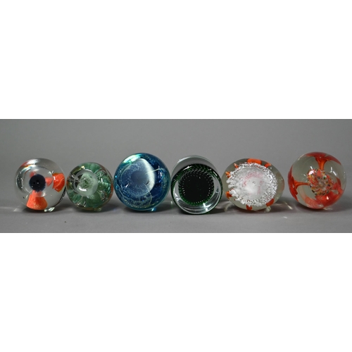 120 - Various paperweights including three Caithness weights and a Selkirk weight, floral specimens etc (b... 