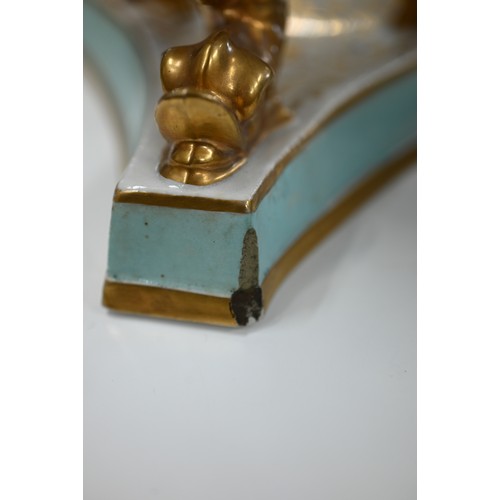 140 - Two early 19th century turquoise-ground and gilt covered urns, the reserves painted with floral spec... 