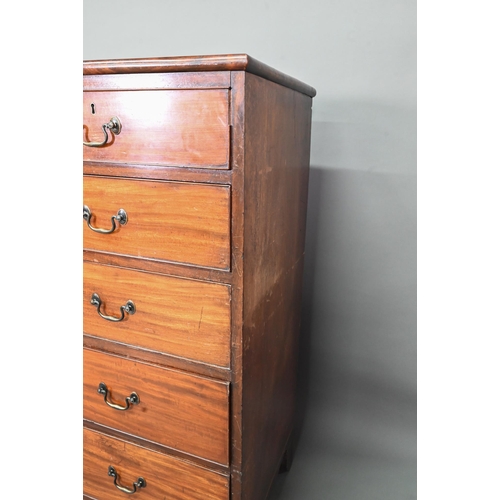 310 - A George III mahogany chest of two short over four long graduated cock-beaded drawers, with brass sw... 