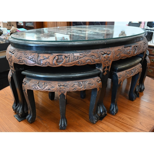 360 - A Chinese part lacquered and carved hardwood oval table, the top with applied imitation mother-of-pe... 