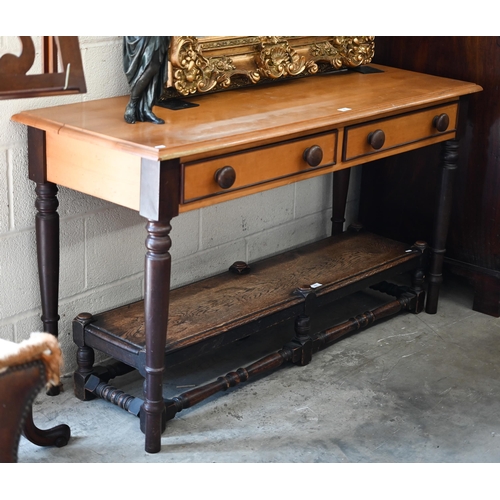 363 - A South African yellow wood hall table with two frieze drawers, stained turned handles and supports,... 