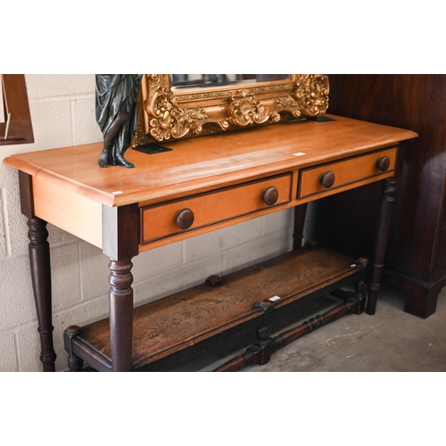 363 - A South African yellow wood hall table with two frieze drawers, stained turned handles and supports,... 