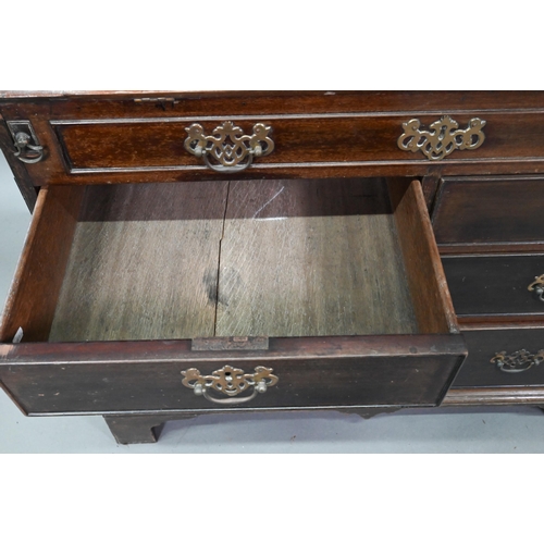 385 - A George III mahogany bureau, the fitted interior with slide top well over a dummy drawer, two short... 