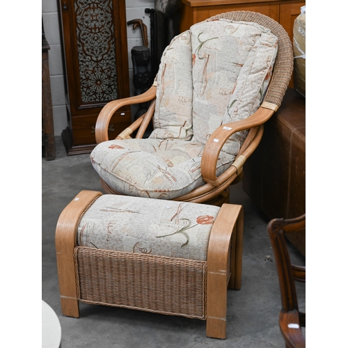 390 - A Daro Shaved cane and rattan swivel armchair with padded cushions in Rochelle fabric to/w matching ... 