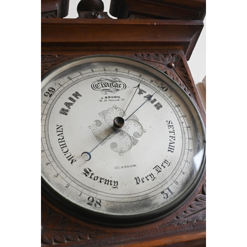 394 - # 'J Brown, Glasgow', carved oak barometer, 28 cm wide x 45 cm high