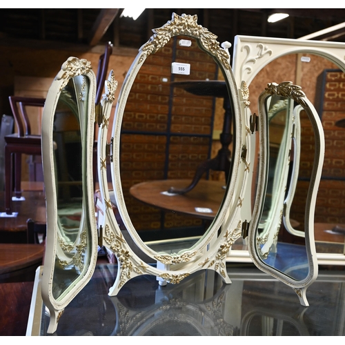 305 - An off-white and gilt folding three panel table top dressing mirror, to/w a white triptych dressing ... 