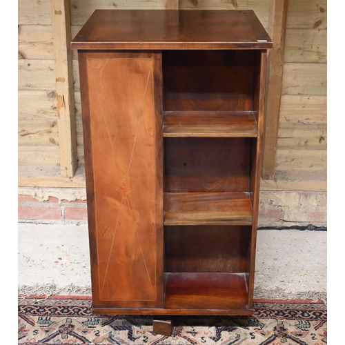 78 - # A reproduction mahogany veneered revolving bookcase, 51 cm x 51 cm x 94 cm h