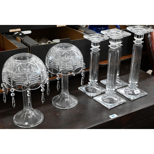 112 - Two large pairs of glass pillar candlesticks and a pair of candle-lamps hung with lustre drops (6)