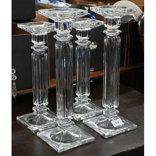 112 - Two large pairs of glass pillar candlesticks and a pair of candle-lamps hung with lustre drops (6)