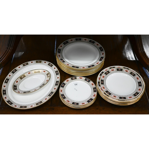 134 - A part set of Royal Crown Derby 'Derby China' pattern dinner-ware, comprising nine 27 cm plates, fiv... 