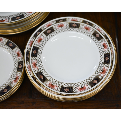 134 - A part set of Royal Crown Derby 'Derby China' pattern dinner-ware, comprising nine 27 cm plates, fiv... 