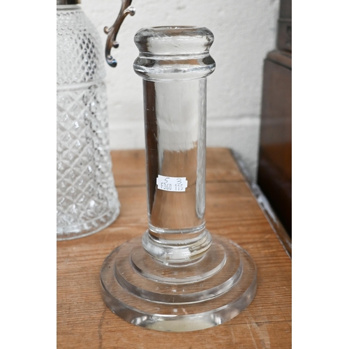 151 - A pressed glass claret jug with ep mounts to/w two Art Deco moulded glass display pillars (3)