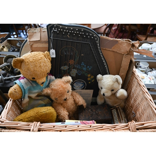 162 - A wicker hamper containing various collectables including Jubel Tone zither, four vintage teddy bear... 