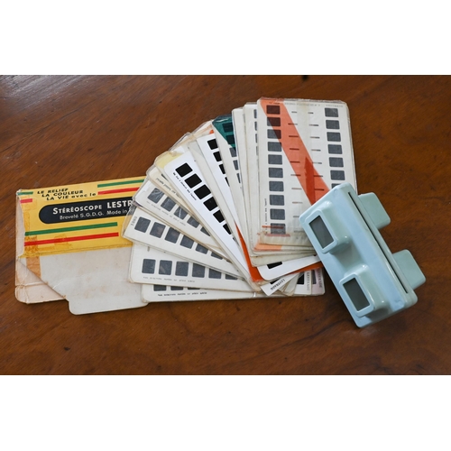 170 - A 1960s vintage Lestrade Stereoscopic viewer to/w a quantity of cards, including four featuring fema... 