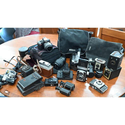 171 - A quantity of cameras including Nikon D3200 digital SLR camera, SLR lenses, vintage cameras, etc all... 