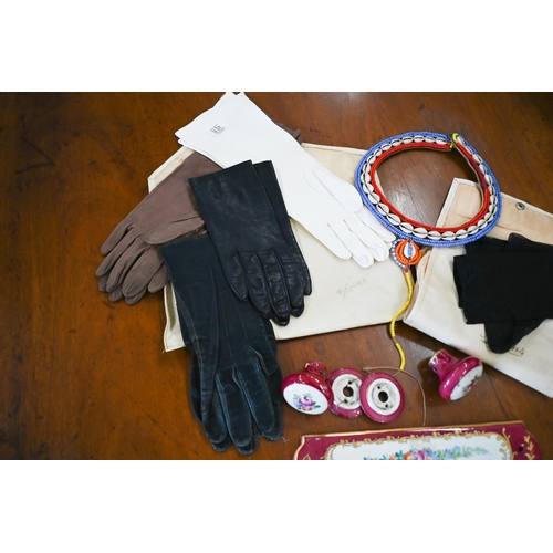 173 - # An African bead and shell collar to/w a quantity of lady's leather gloves and nylons in leatherett... 