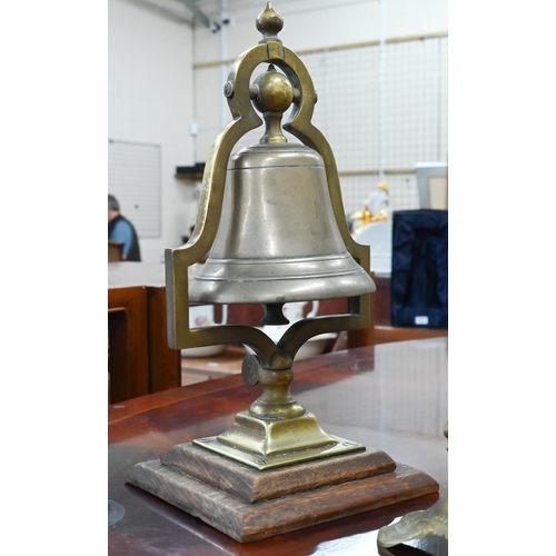 179 - A modern brass Armillary sundial, 15 cm diameter, to/w a counter-bell on a bracket and a brass desk-... 