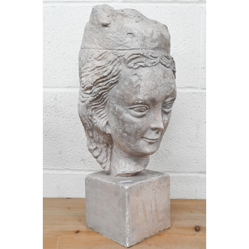 207 - A cast stone female head, 45 cm high