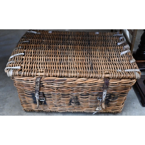 212 - A large  wicker laundry hamper containing a quantity of copper and brassware