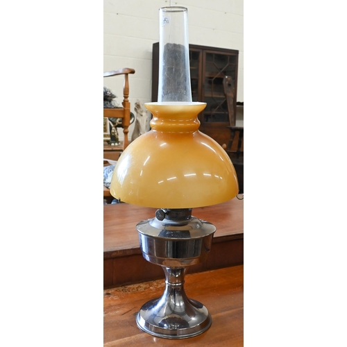 216 - A chrome oil lamp with glass shade