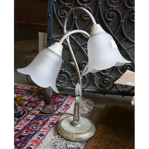 218 - # A wrought iron spark-guard, to/w a table lamp with two floral glass shades and a box of turned woo... 