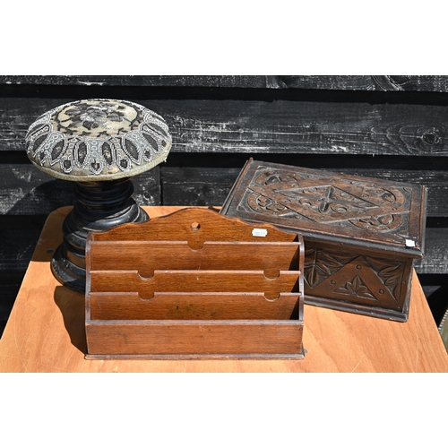 230 - A Victorian beaded stool on turned base to/w a stationery rack and a carved oak box (3)