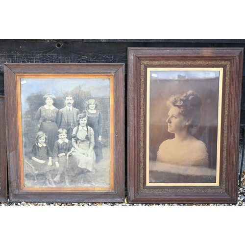 238 - An Eastern copper tray, to/w four large antique family photographs (5)