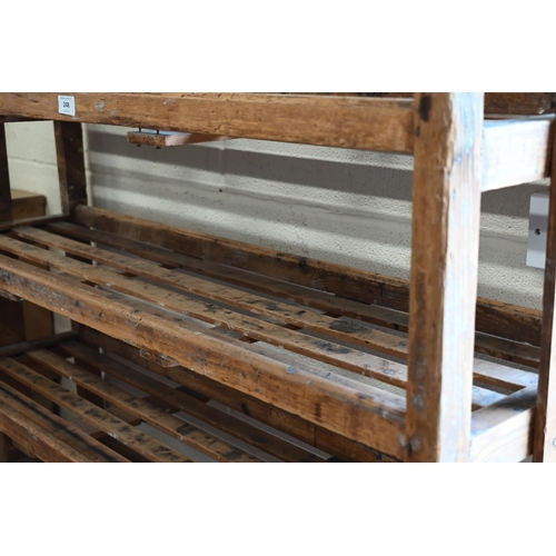 248 - Vintage pine ceramics studio drying rack with five open slatted shelves, on metal casters, 120 cm wi... 