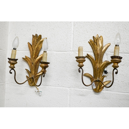 301 - A pair of giltwood twin branch foliate wall sconces