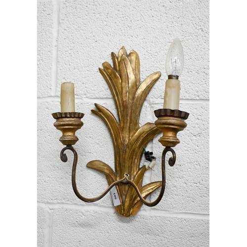 301 - A pair of giltwood twin branch foliate wall sconces