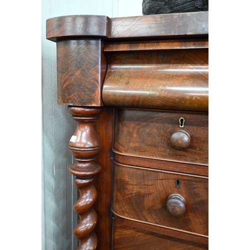 317 - A large Victorian mahogany chest with cavetto drawer over an arrangement of seven other drawers betw... 