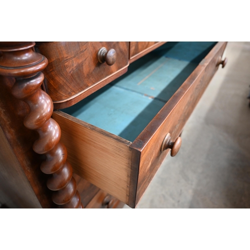 317 - A large Victorian mahogany chest with cavetto drawer over an arrangement of seven other drawers betw... 