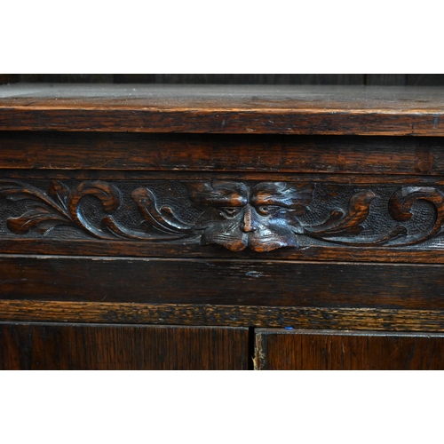 327 - A small carved oak dresser, 80 cm wide x 40 cm deep x 190 cm high