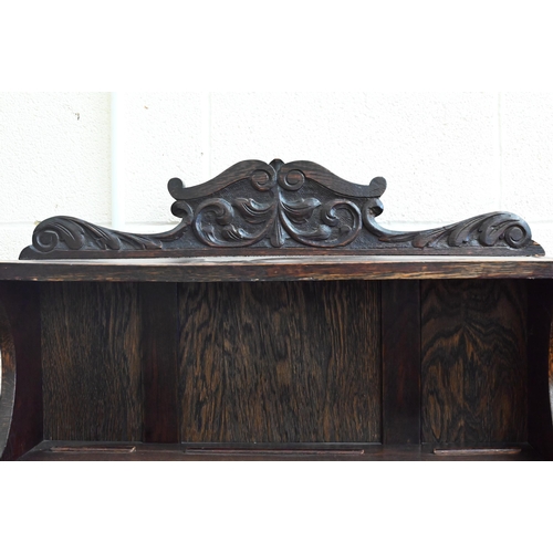 327 - A small carved oak dresser, 80 cm wide x 40 cm deep x 190 cm high