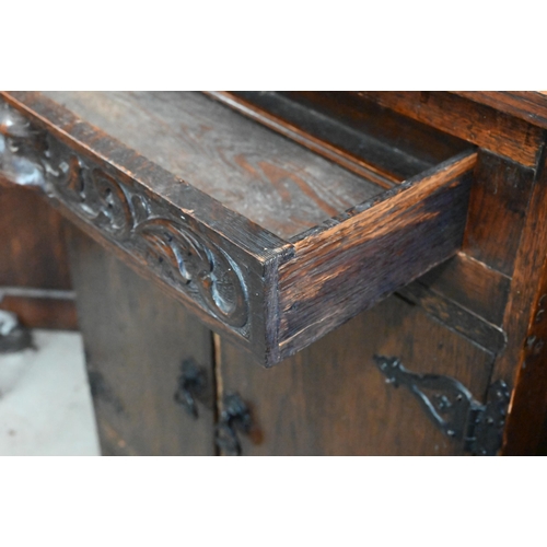 327 - A small carved oak dresser, 80 cm wide x 40 cm deep x 190 cm high