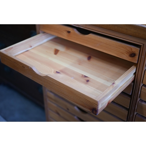 338 - A beech and pine twenty-six drawer plan chest, 102 x 70 x 102 cm