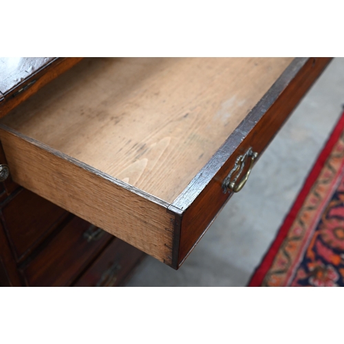 349 - A George III mahogany bureau with four graduating drawers, standing on bracket feet a/f, 100 x 53 x ... 