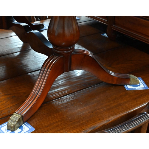 356 - # Reproduction flame mahogany crossbanded oval coffee table