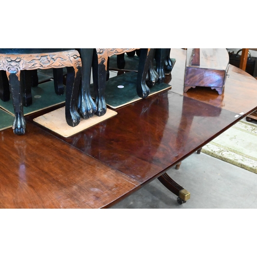 358 - A Regency style mahogany extending dining table with single central leaf on twin pedestal supports, ... 