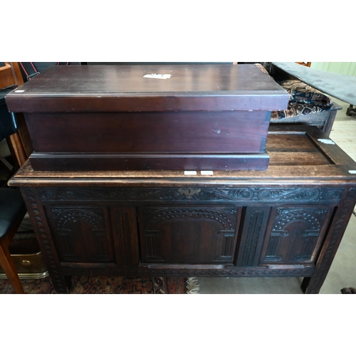 369 - A carved oak panelled coffer 118 x 44 x 60 cmh to/w a trunk (2)