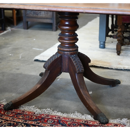 400 - # A 19th century mahogany dining table, moulded edge square top on turned column and quad supports, ... 