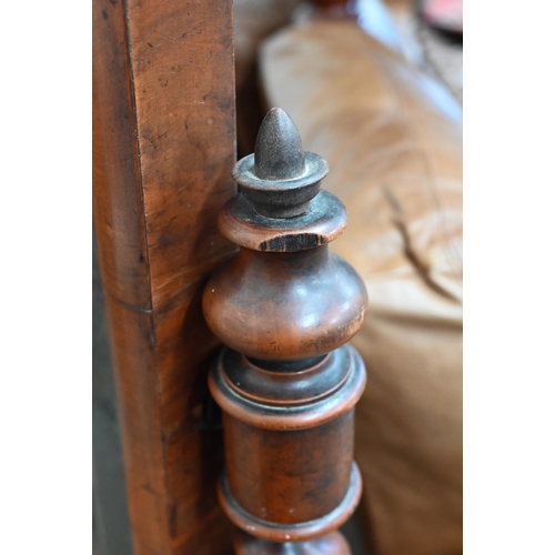 405 - A 19th century mahogany framed cheval mirror with bevelled plate and barley twist supports and shape... 