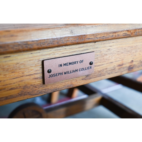 410 - A panelled oak church armchair to/w pair of matching side chairs, with inscription 'IHS' (3)