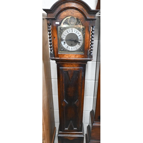 418 - An oak shortcase clock with geometric panelled case, brass dial and triple train movement, Westminst... 