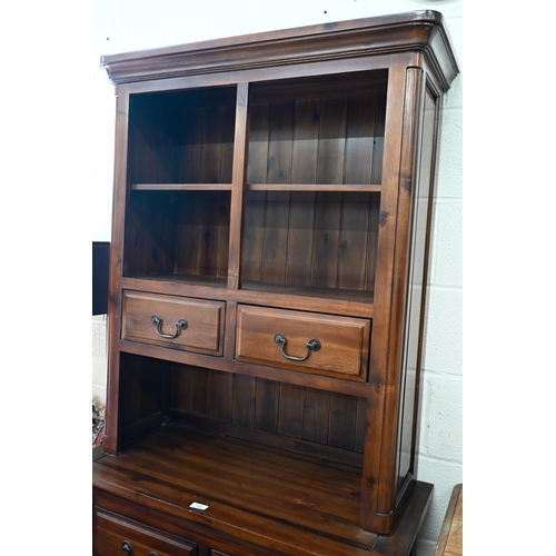 438 - A modern hardwood (Oak Furniture Land, Cranbrook) dresser with four drawers and panelled cupboards, ... 