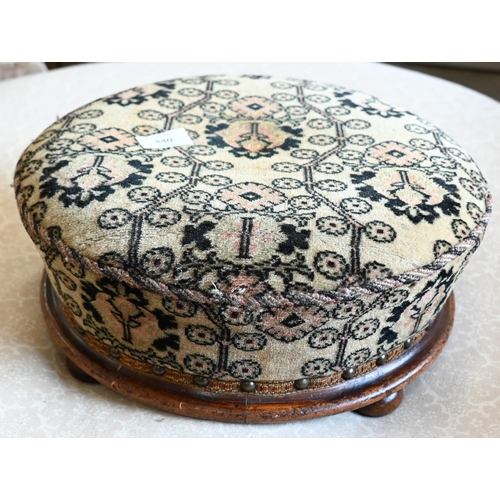 440 - A mahogany framed circular footstool with studded foliate upholstery, 36 cm dia.