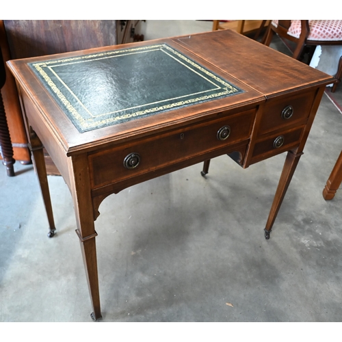 441 - An Edwardian walnut crossbanded desk with gilt tooled green leather top and hinged panel enclosing f... 