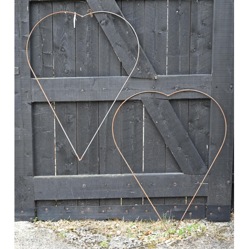 45 - A pair of steel twin heart form plant frames (2)