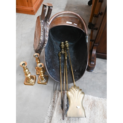 452 - # Antique copper coal scuttle to/w elm and leather bellows and brass fire tools