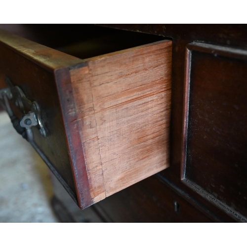 456 - # An antique walnut chest of two short over two long graduated drawers on a plinth base, lacking top... 